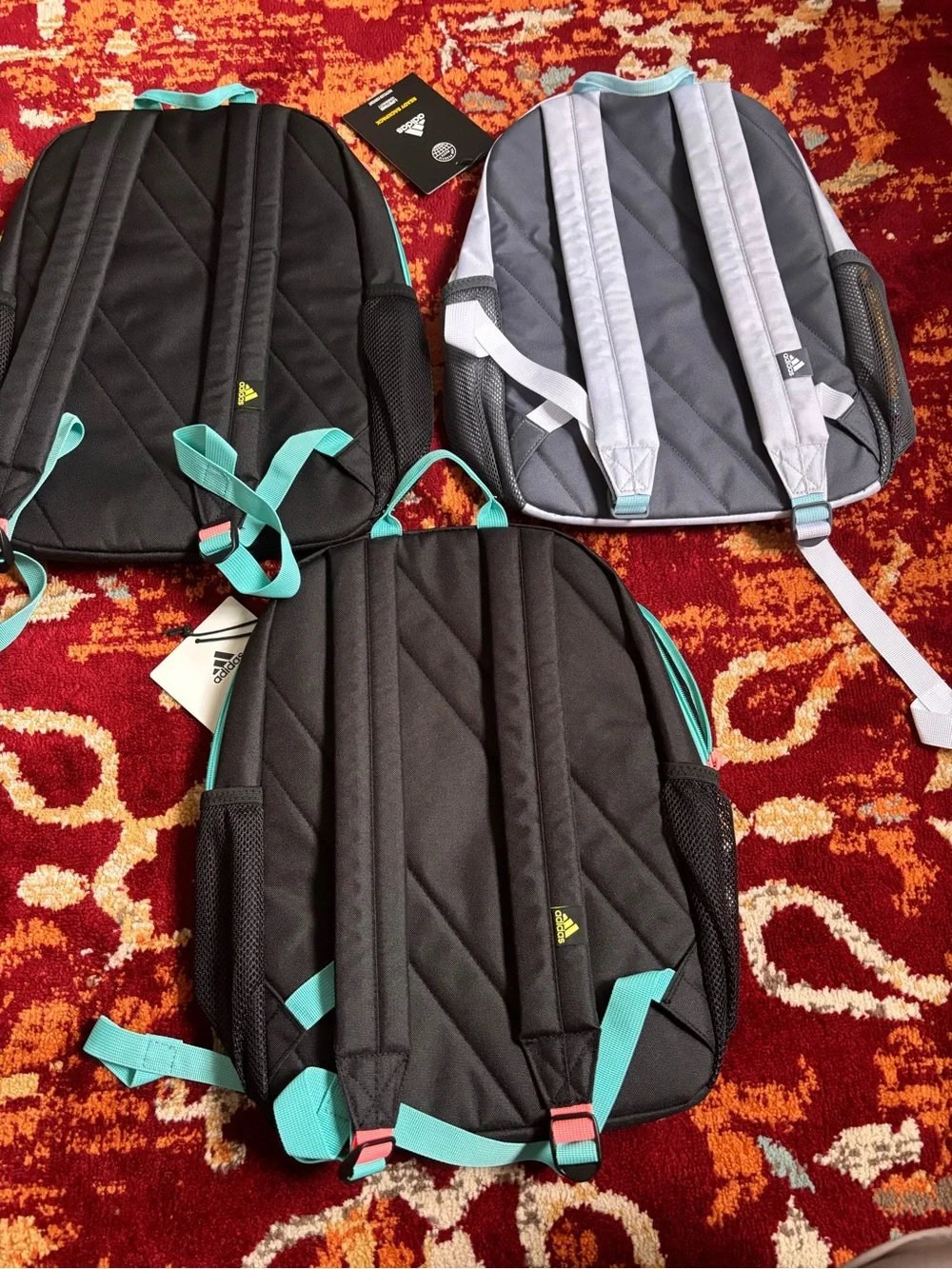 adidas Black Backpack with Teal Trim and Straps